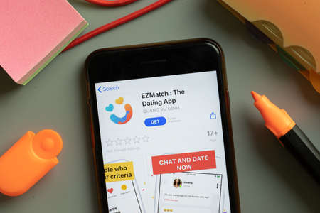 New York, USA - 29 September 2020: EZMatch The Dating App mobile logo on phone screen close up, Illustrative Editorial.のeditorial素材