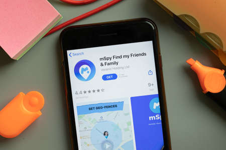 New York, USA - September 29, 2020: mSpy Find my friends mobile app logo on phone screen close up, Illustrative Editorial.のeditorial素材