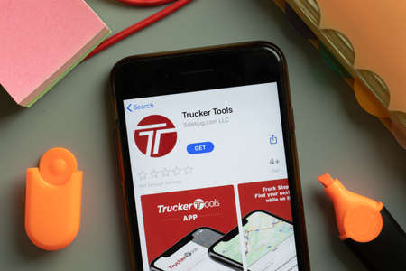 New York, USA - 29 September 2020: Trucker Tools mobile app logo on phone screen close up, Illustrative Editorial.のeditorial素材