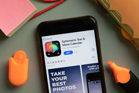 New York, USA - 29 September 2020: Ephemeris Sun Moon Calendar mobile app logo on phone screen close up, Illustrative Editorial.のeditorial素材