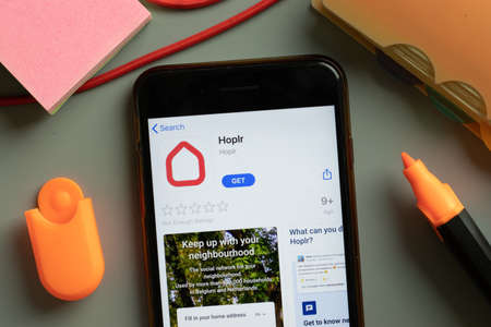 New York, USA - 29 September 2020: Hoplr mobile app logo on phone screen close up, Illustrative Editorial.のeditorial素材