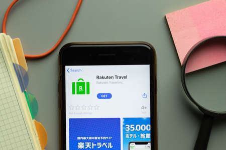 New York, USA - 26 October 2020: Rakuten Travel mobile app logo on phone screen close up, Illustrative Editorial.のeditorial素材