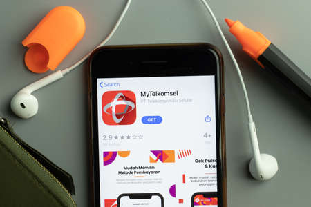 New York, USA - 26 October 2020: MyTelkomsel mobile app icon logo on phone screen close-up, Illustrative Editorial.のeditorial素材