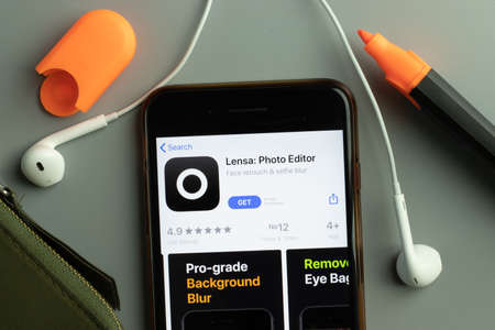 New York, USA - 26 October 2020: Lensa Photo Editor mobile app icon logo on phone screen close-up, Illustrative Editorial.のeditorial素材