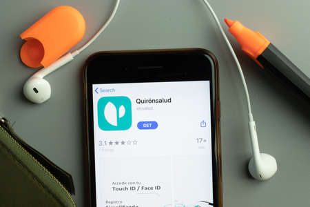 New York, USA - 26 October 2020: Quironsalud mobile app icon logo on phone screen close-up,...