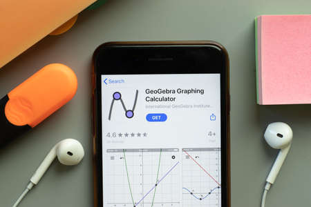 New York, USA - 1 December 2020: GeoGebra Graphing Calculator mobile app icon on phone screen top view, Illustrative Editorial.のeditorial素材