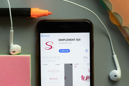 New York, USA - 1 December 2020: SIMPLEMENT SOI mobile app icon on phone screen top view,...