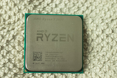 Moscow, Russia - 5 December 2020: AMD Ryzen processor, CPU chip close-up, Illustrative Editorial.