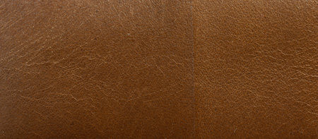 Leather brown background, leather material texture photo.