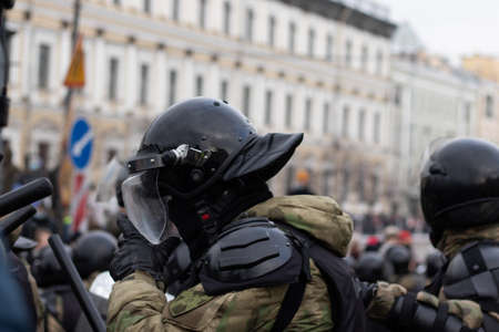Saint Petersburg, Russia - 31 January 2021: Riot Police armored on street, Illustrative Editorial.のeditorial素材
