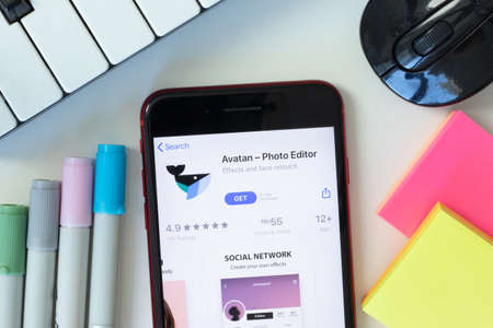 New York, USA - 2 March 2021: Avatan - Photo Editor mobile app icon on phone screen, Illustrative Editorialのeditorial素材