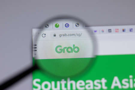 New York, USA - 18 March 2021: Grab company logo icon on website, Illustrative Editorialのeditorial素材