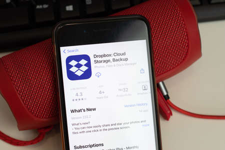New York, USA - 26 April 2021: Dropbox mobile app logo, phone with icon, Illustrative Editorialのeditorial素材