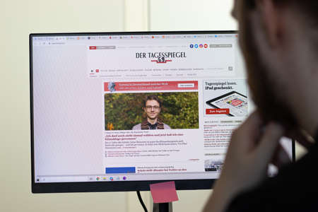 New York, USA - 26 April 2021: Tagesspiegel website page on screen, man using service, Illustrative...
