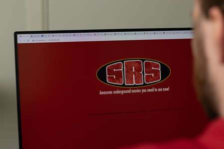 New York, USA - 1 May 2021: SRS Cinemas company website with logo on screen, Illustrative Editorial