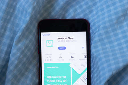 New York, USA - 1 June 2021: Weverse Shop mobile app logo on phone screen, close-up icon,...