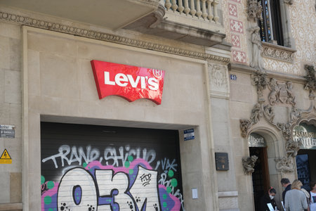 Barcelona, Spain - 5 November 2021: Levis Levi clothes brand store sign outdoor on street,...