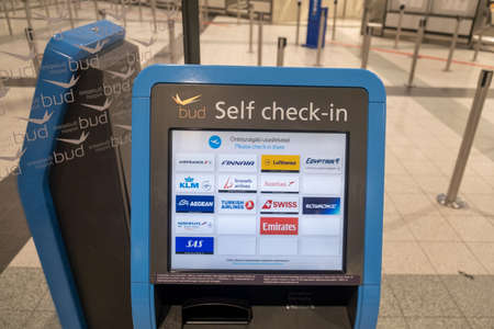 Budapest, Hungary - 1 November 2021: Self Check-in terminal in airport, Illustrative Editorial.のeditorial素材