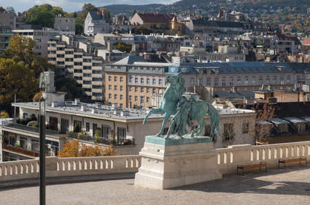 Budapest, Hungary - 1 November 2021: Hortobagy horse herd, man and horse statue in Buda Castle, horseman monument and cityscape, Illustrative Editorial.のeditorial素材