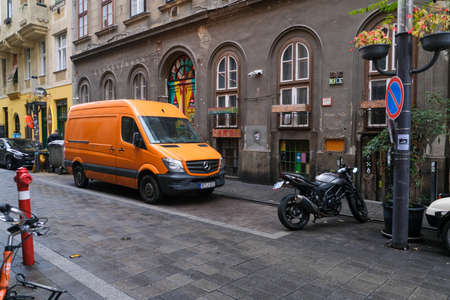 Budapest, Hungary - 1 November 2021: Beautiful european street with different bright colors, graffiti and street art, Illustrative Editorial.のeditorial素材