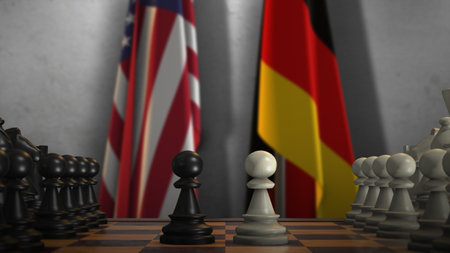 Germany and USA National Flags with Chess Board 3D Illustration. Politics of Government or Conflict of Countries Concept.の写真素材