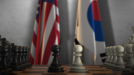 South Korea and USA National Flags with Chess Board 3D Illustration. Politics of Government or Conflict of Countries Concept.の写真素材