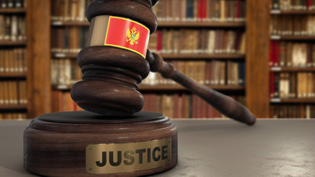 Montenegro Flag on Judge Hammer in Court with Word Justice. Justice System 3D Illustration.の写真素材