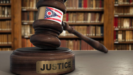 Ohio State Flag on Judge Hammer in Court with Word Justice. Justice System 3D Illustration.の写真素材