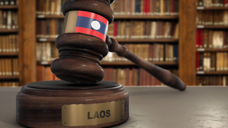 Laos Flag on Judge Gavel or Hammer in Court with Country Name. Legal System 3D Illustration.の写真素材