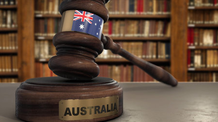Australia Flag on Judge Gavel or Hammer in Court with Country Name. Legal System 3D Illustration.の写真素材