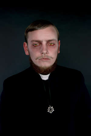 Halloween. A man dressed as the evil Catholic priestの写真素材