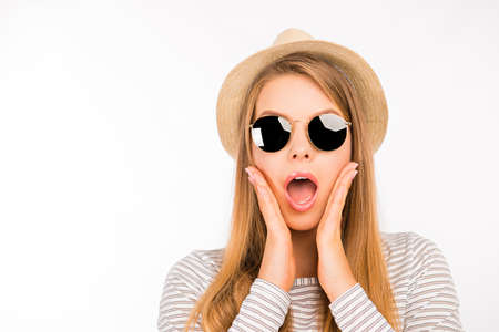 emotional girl in a hat is surprisedの写真素材