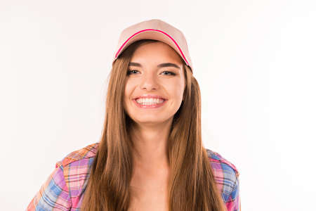 cute girl with pink capの写真素材