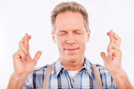 Handsome aged man waiting for special momentの写真素材