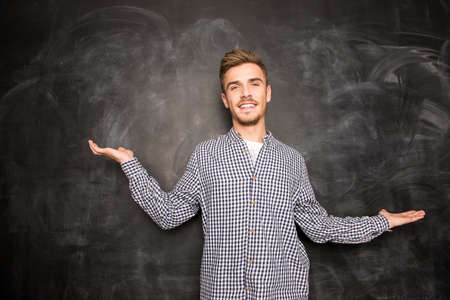 Portrait of handsome man  on chalkboardの写真素材