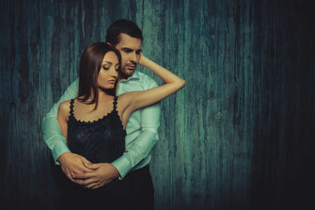 passionate confident couple in love embracing each otherの写真素材