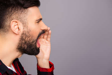 Side view photo of young man making important announcement