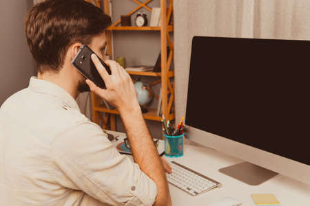 Close up photo of successful businessman having conversation with clientsの写真素材