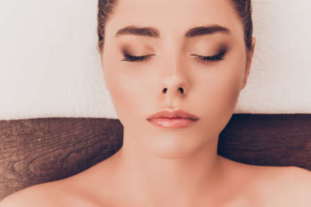 Close up portrait of beautiful woman's face with perfect skin and makeup
