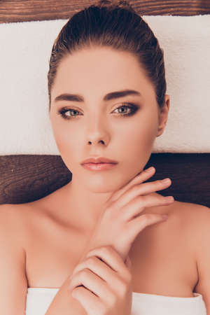 Portrait of calm sensual  woman relaxing in spa salon