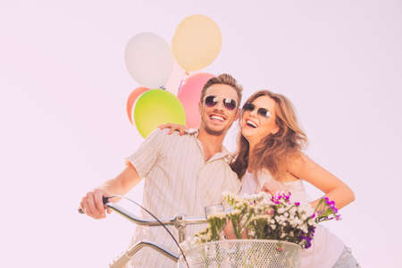 Young happy man and woman having fun and laughingの写真素材