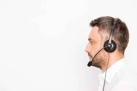 Side view portrait of handsome young man in headphonesの写真素材