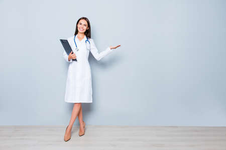 Smiling doctor making presentation of new clinical productの写真素材