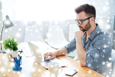 Concentrated ponder man finding thinking about task, winter conceptの写真素材