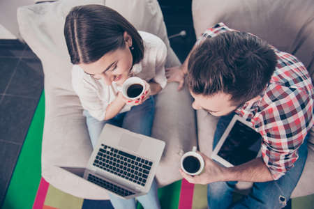 Top view of two colleagues working together on projectの写真素材