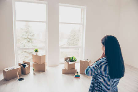 Dream come true! A start of new life! Brunette woman moved in to new light and modern apartment. She...