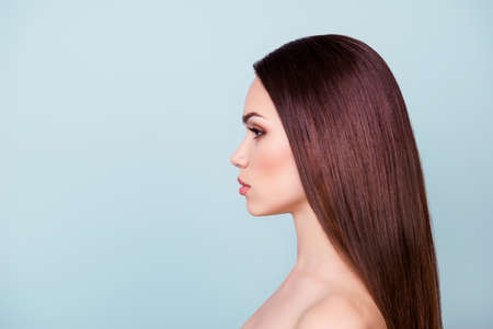 wellbeing and wellness, beauty and health concept. coseup side profile photo of young brunette girl. her hair and skin looks so fresh, healthy and attractiveの写真素材