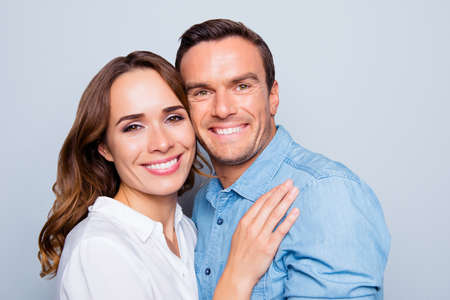 Close up portrait of mature, adult, attractive, cute, lovely couple with beaming smiles, check to...