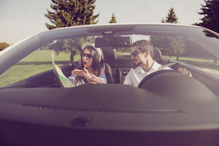 Front view through window of family, date journey trip, escape ride, vehicle rent. Married driver...