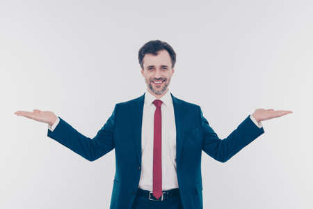 What do you want to choose Portrait of excited joyful cheerful confident proffi agent demonstrating two directions ways with handsの写真素材